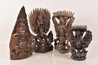 Lot 115 - Four Indonesian carved wooden figures