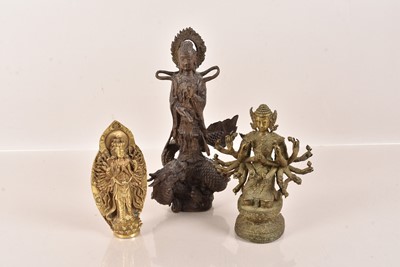 Lot 119 - A Chinese/Tibetan brass figure of Avalokiteshvara