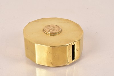 Lot 131 - An early to mid 20th Century Brass Money Box