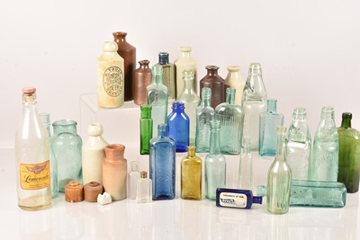 Lot 135 - A collection of 50+ vintage glass bottles