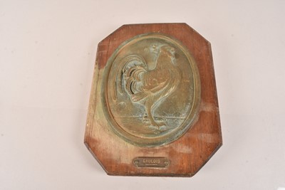 Lot 138 - A bronze plaque depicting a Rooster