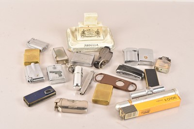 Lot 145 - An assortment of Lighters and Smoking Related items