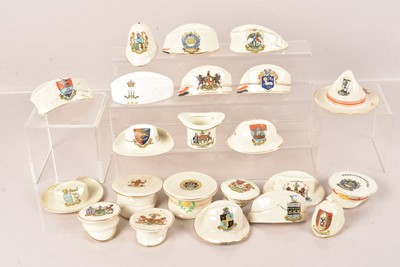 Lot 275 - A collection of Military Caps and Helmets