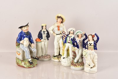 Lot 477 - An early 19th Century Staffordshire Toby Jug