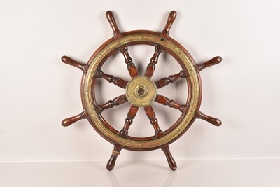 Lot 517 - A Vintage Mahogany and Brass Ships Wheel