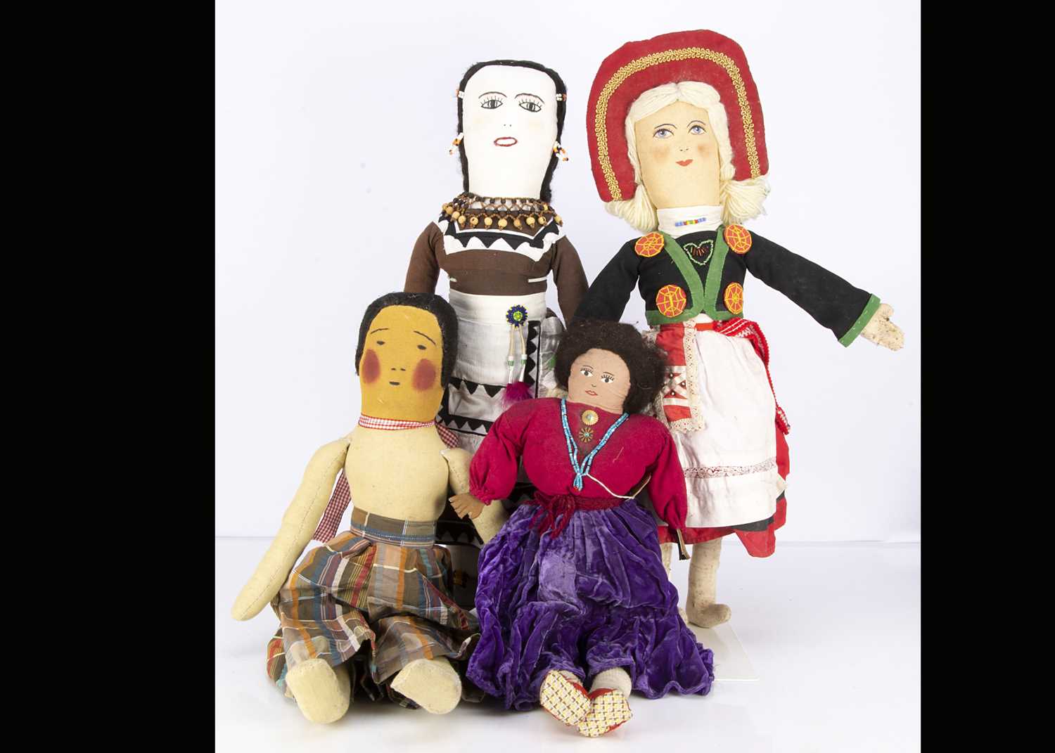 Lot 1347 - Four cloth Native American Indian dolls