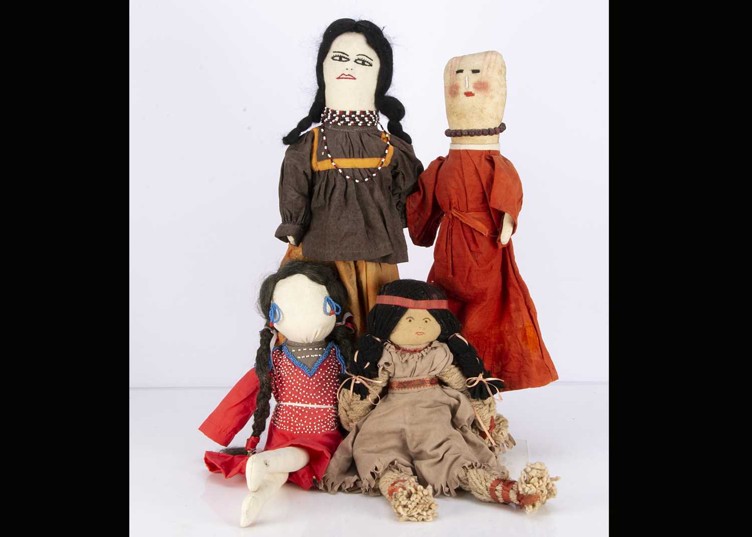 Lot 1348 - Four cloth Native American Indian squaw dolls