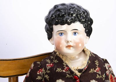 Lot 1364 - A 19th century pink tinted china shoulder head doll