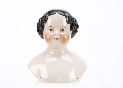 Lot 1367 - A large 19th century German pink tinted china shoulder head child doll