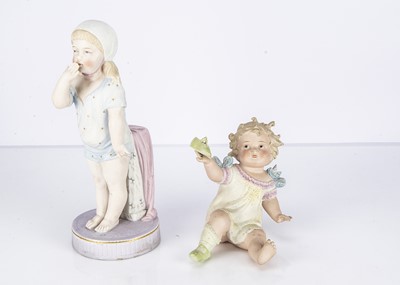 Lot 1369 - Two bisque child figurens