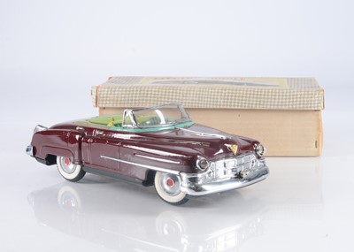 Lot 307 - A 1950's T.N Nomura (Japan) Tinplate Battery-Operated Electric Mobile Cadillac