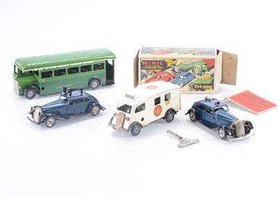 Lot 340 - Tri-ang Minic boxed and unboxed Clockwork Tin Public Service Vehicles (4)