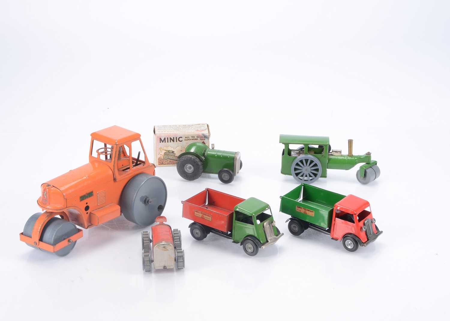 Lot 342 - Tri-ang Minic post-war clockwork Tin Construction vehicles and a larger scale steam roller (6)