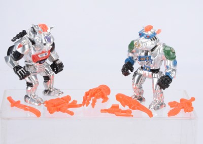 Lot 352 - Playmates Teenage Muntant Ninja Turtles (TMNT) Robotic Bebop & Rocksteady Action Figures