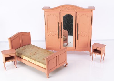 Lot 1395 - A doll’s pink painted wooden bedroom suite