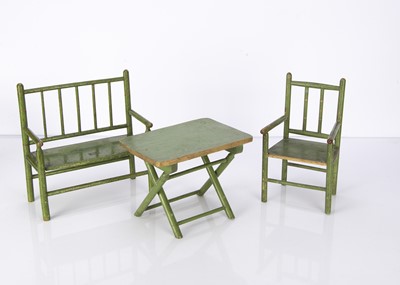 Lot 1401 - A doll’s green painted wooden garden furniture set