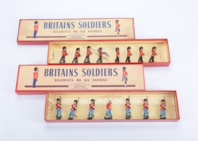 Lot 589 - Britains post WW2 sets in ROAN boxes comprising 8pce set 82 Colours and Pioneers of the Scots Guards and 7pce 2019 Danish Army Life Guards (Full Dress)