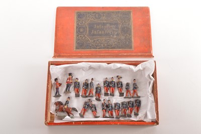 Lot 617 - Noris (Gebruder Heinrich) late 19th early 20th Century 55mm scale - 60mm overall - French or Polish soldiers in original wooden box