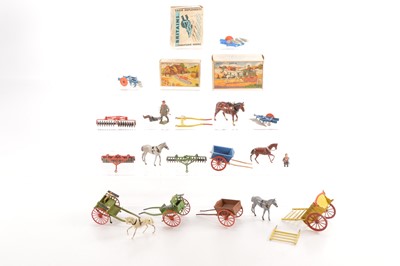 Lot 656 - Britains loose farm carts comprising post WW2 Tumbrel in yellow - complete with raves and horse but replaced gate