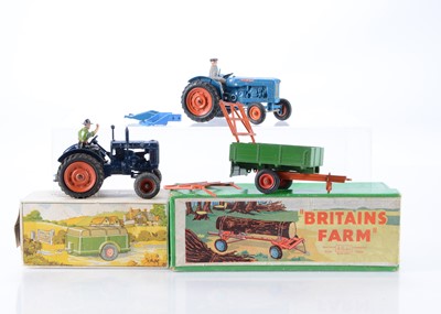 Lot 662 - Britains loose 128F Fordson Major and 9526 Fordson Super Major tractors with implements comprising boxed 129F Timber Trailer - tractor drawn