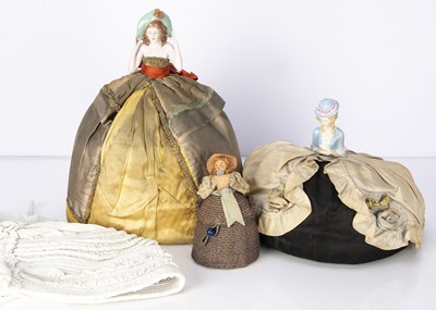 Lot 1425 - Two German china half dolls made up as tea cosies