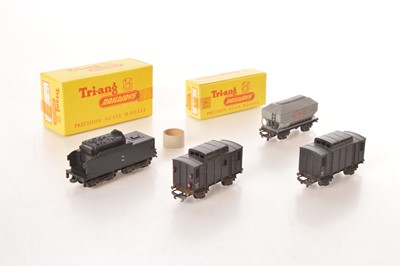 Lot 61 - Tri-ang TT Gauge boxed and unboxed Continental wagons and black Continental Pacific Tender (4)