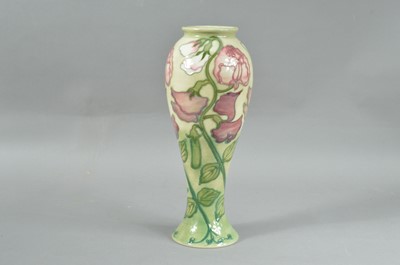 Lot 23 - A damaged Moorcroft pottery collectors club vase