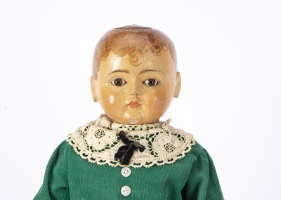 Lot 1453 - A rare German Tout en Bois jointed wooden boy doll