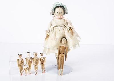 Lot 1454 - Seven German peg wooden dolls