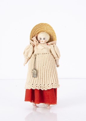 Lot 1459 - A small bisque shoulder head doll