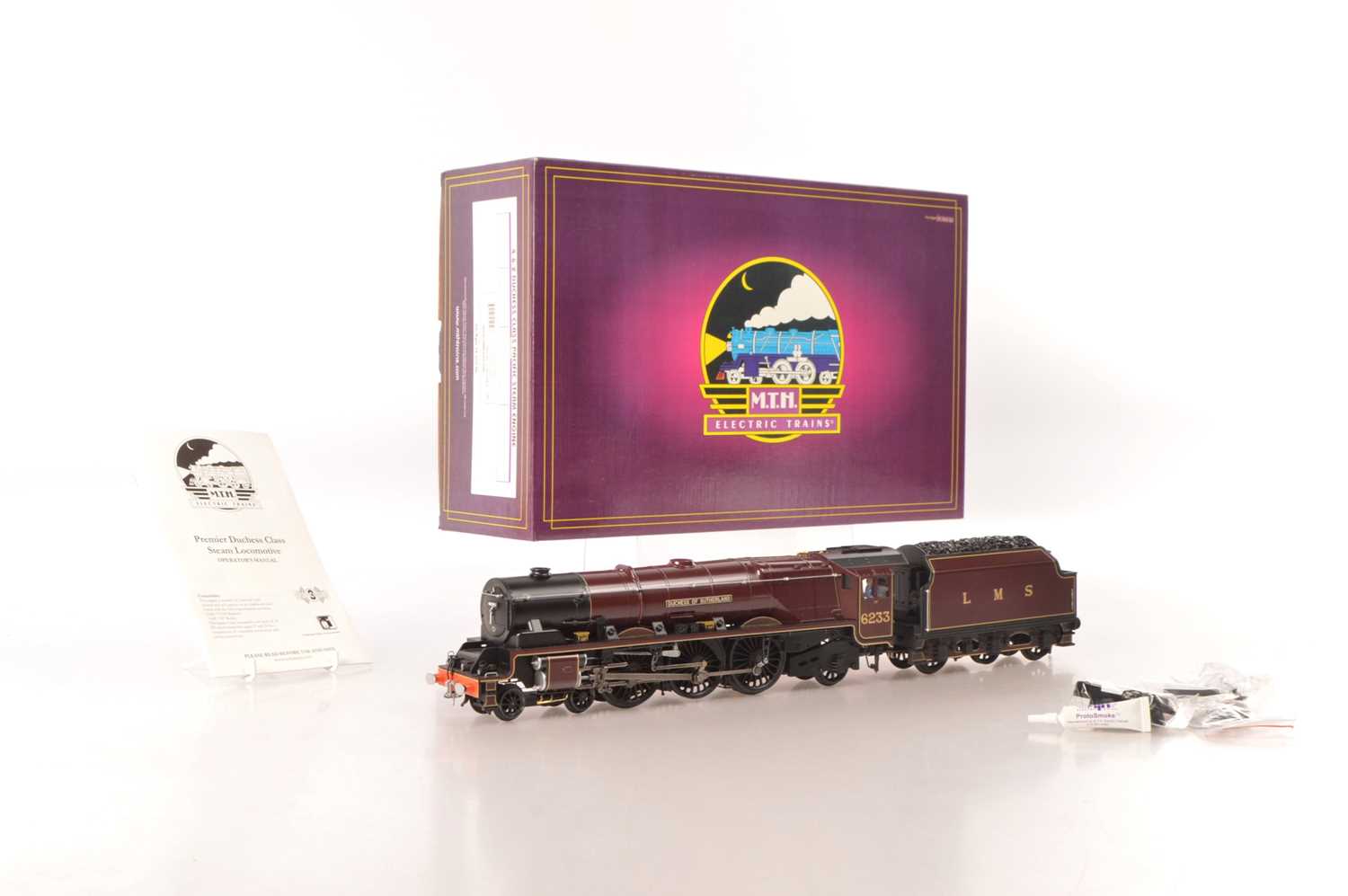 Lot 478 - MTH (Mikes Train House - USA) Modern issue 0 Gauge Ref: 20-3368-1 4-6-2 Loco & Tender LMS maroon 'Duchess of Sutherland'