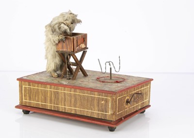 Lot 1470 - A hand-cranked musical rabbit street barrel organist automaton