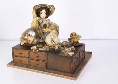 Lot 1472 - A Sands Film film or television theatrical property doll with milliner stall