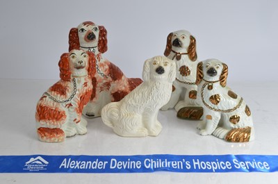 Lot 5 - Five Victorian Staffordshire pottery spaniels