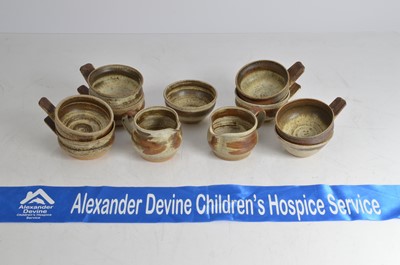 Lot 12 - A set of Grindon studio pottery dishes, bowls and jugs