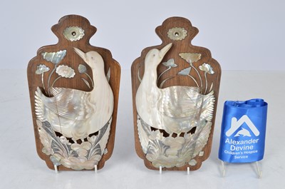 Lot 40 - A pair of avian wall pockets