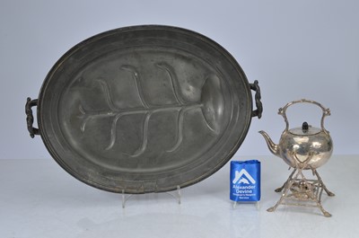 Lot 70 - Large pewter meat charger and silver plated kettle on warmer stand