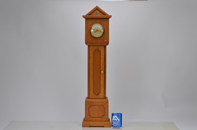 Lot 84 - Small German longcase quartz clock