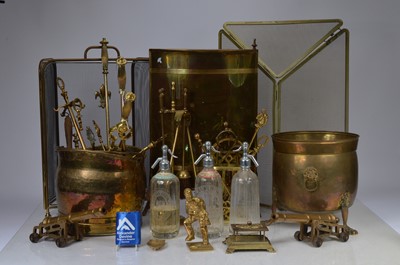 Lot 87 - A large collection of brass fireside items