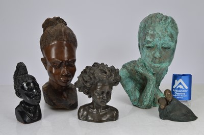 Lot 89 - Five African facial sculptures in stone, resin etc