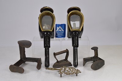 Lot 141 - A miscellaneous lot including  two Victorian coach lamps, two shoe lasts, flat iron and trivet