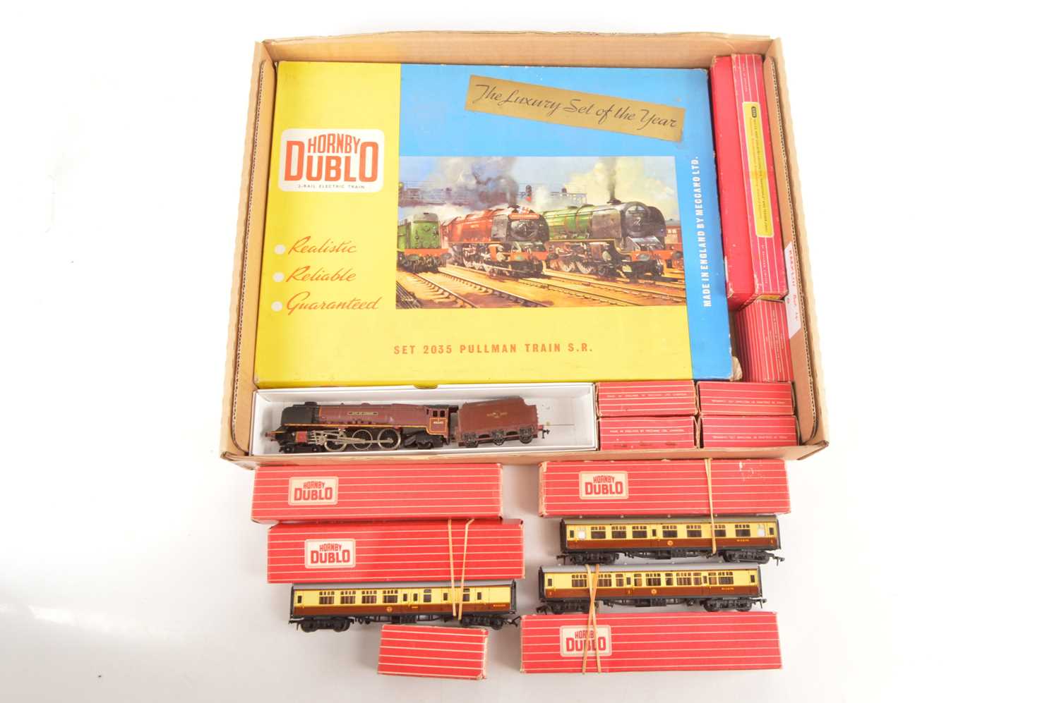 Lot 101 - Hornby-Dublo 00 Gauge 2-Rail 2035 Pullman Train Part Set and boxed and unboxed 'Barnstable' and 'City of London' Locomotives and Goods and Passenger Rolling Stock and empty boxes (13)
