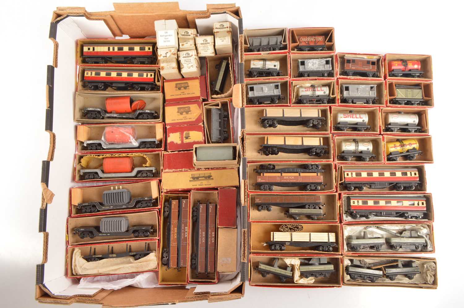 Lot 144 - Trix 00 Gauge boxed short bogie Coaches and various Goods wagons including Boiler wagons and Breakdown Cranes (50)