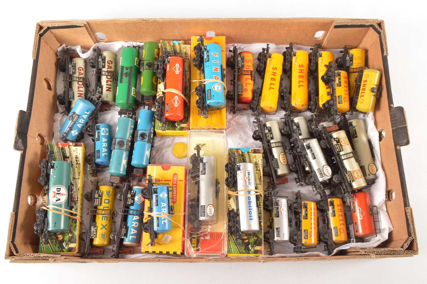 Lot 180 - Large collection of Trix HO Gauge 4-wheel and bogie Tank wagons from various era's (33)