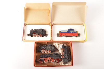 Lot 183 - Trix Express HO Gauge AC and DC boxed and unboxed DB black Tank Engines and blue Diesel Shunter (5)