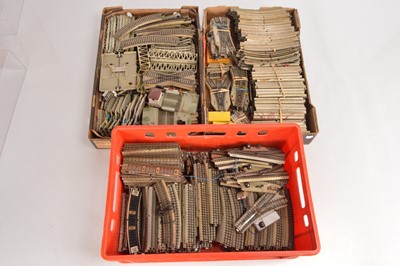 Lot 327 - Very large collection of Marklin HO Gauge unboxed 3-Rail and 3-Rail Stud Track including Points and crossing (approx 500 pieces in three boxes)