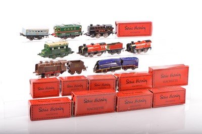Lot 573 - Hachette (French - Hornby Style) 0 Gauge Modern issue Group of Locomotives (7) and Coaches and Wagons (60+)