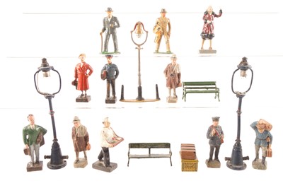 Lot 578 - Collection of 0 Gauge and Gauge 1 and 2 Railway Passengers by Elastolin and Leyla  and other makers and Hornby luggage and Seats and large scale Station Lamps (18)