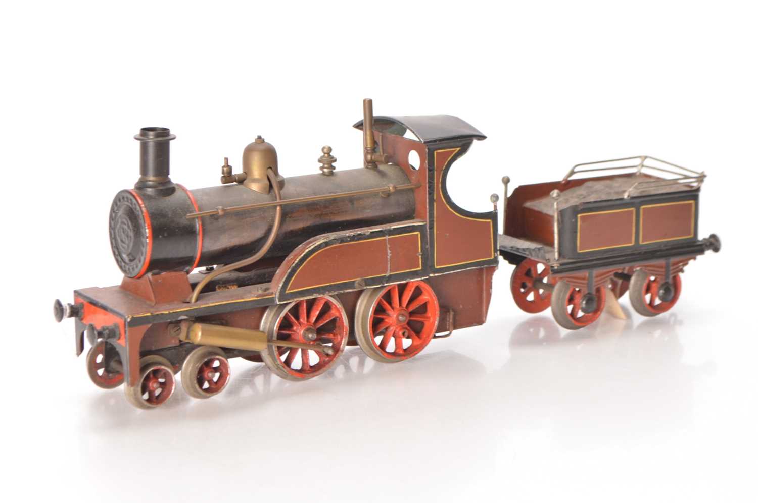 Lot 631 - Carette Gauge 1 4-4-0 Loco & Tender lined brown
