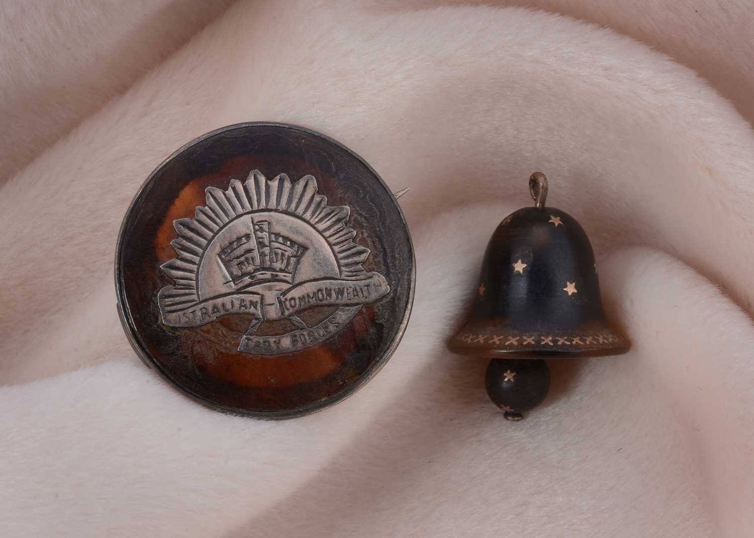 Lot 8 - A 19th Century pique work bell charm
